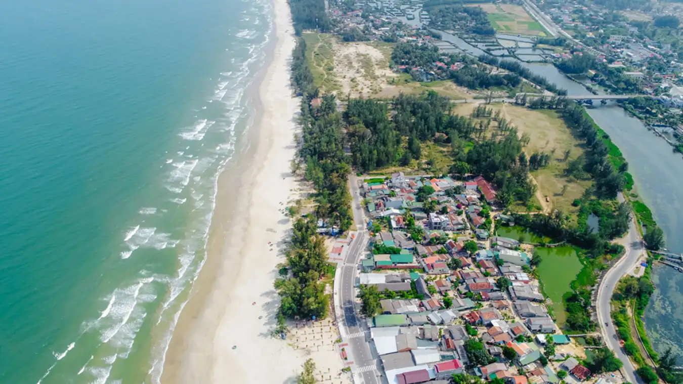 Aerial view of My Khe Beach with clear water and long sandy coastline