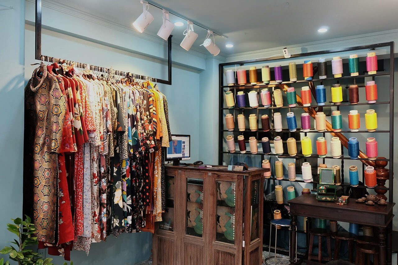 Colorful silk fabrics and traditional garments in a textile section
