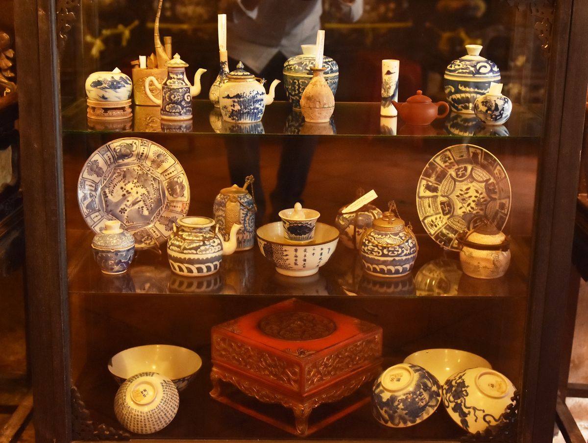 Confucius Cup artifact displayed inside a traditional merchant residence