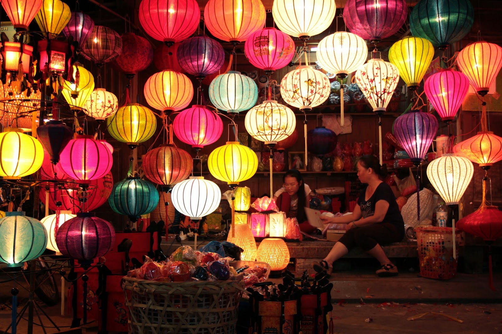 Hoi An night market with lanterns and street food stalls