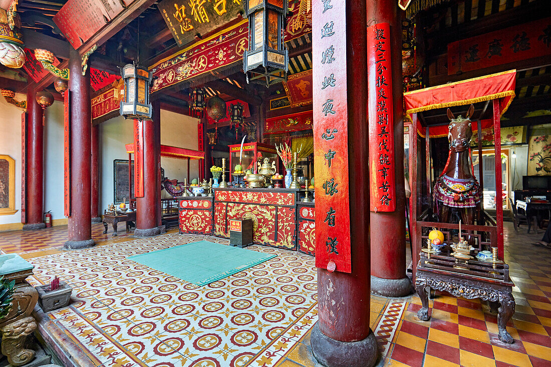 Incense offerings and traditional worship altar inside a historic shrine