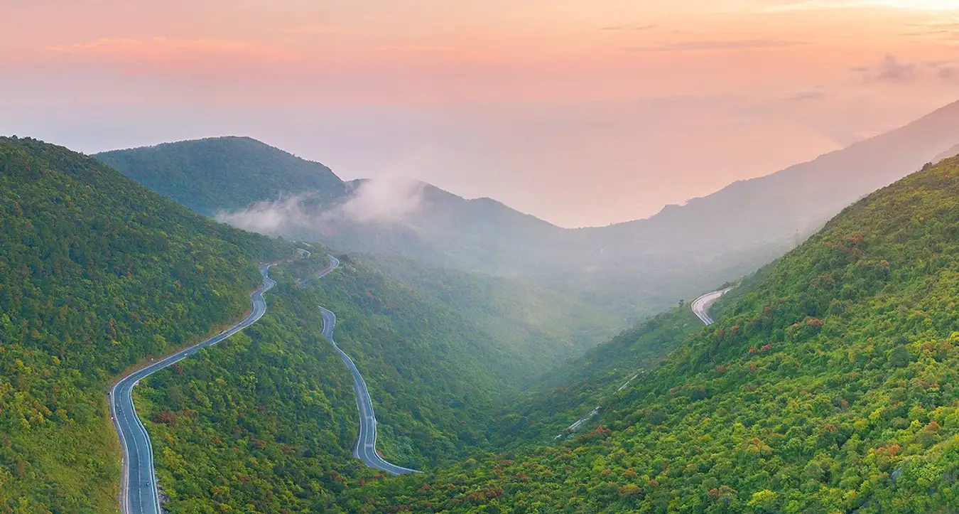 Mountain pass covered in mist during the rainy season in central Vietnam
