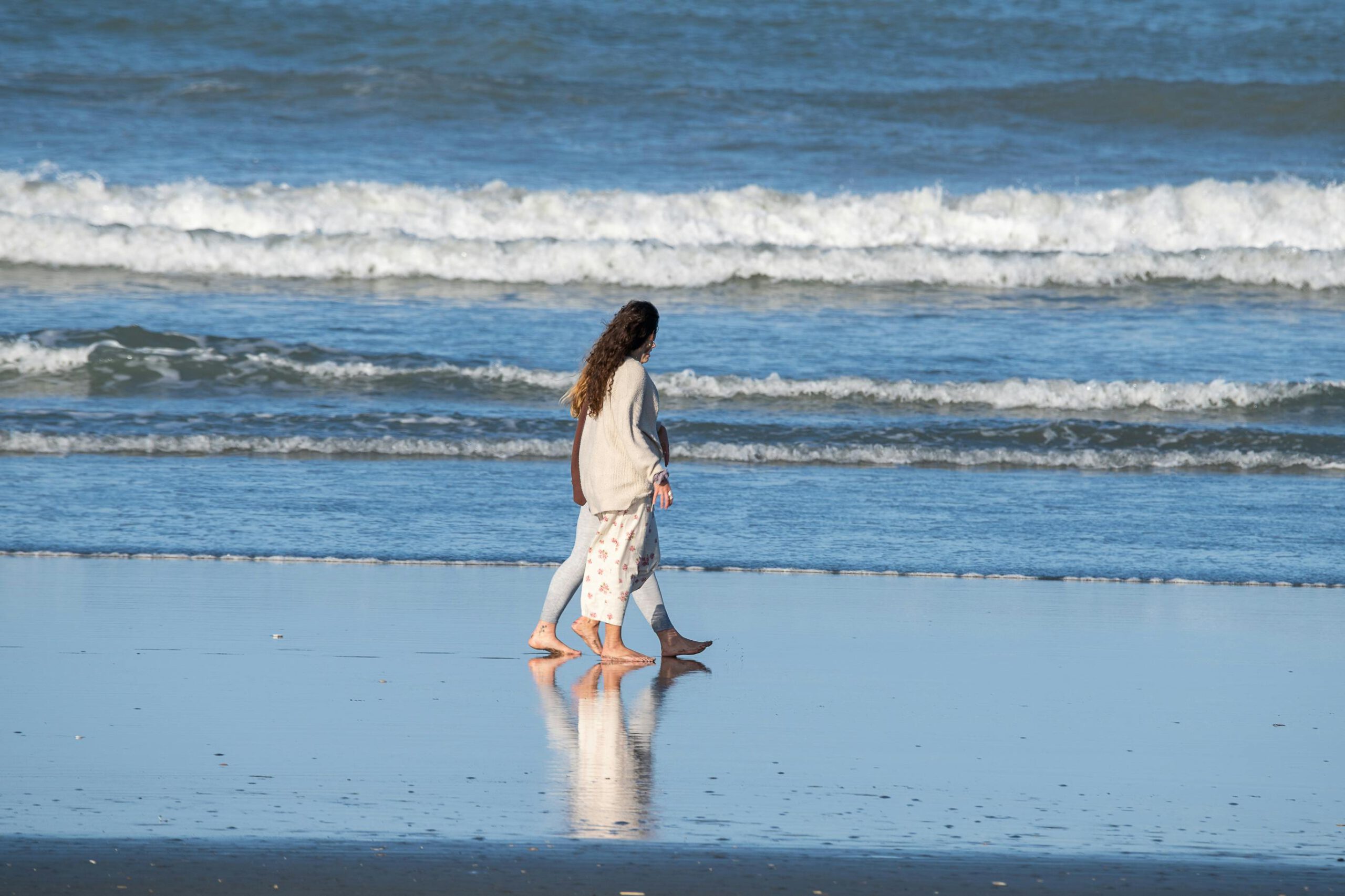 Peaceful morning walk along a sandy beach near Hoi An