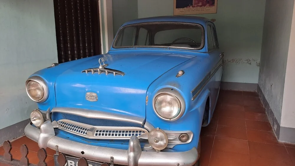 Preserved vintage Austin car inside the pagoda grounds