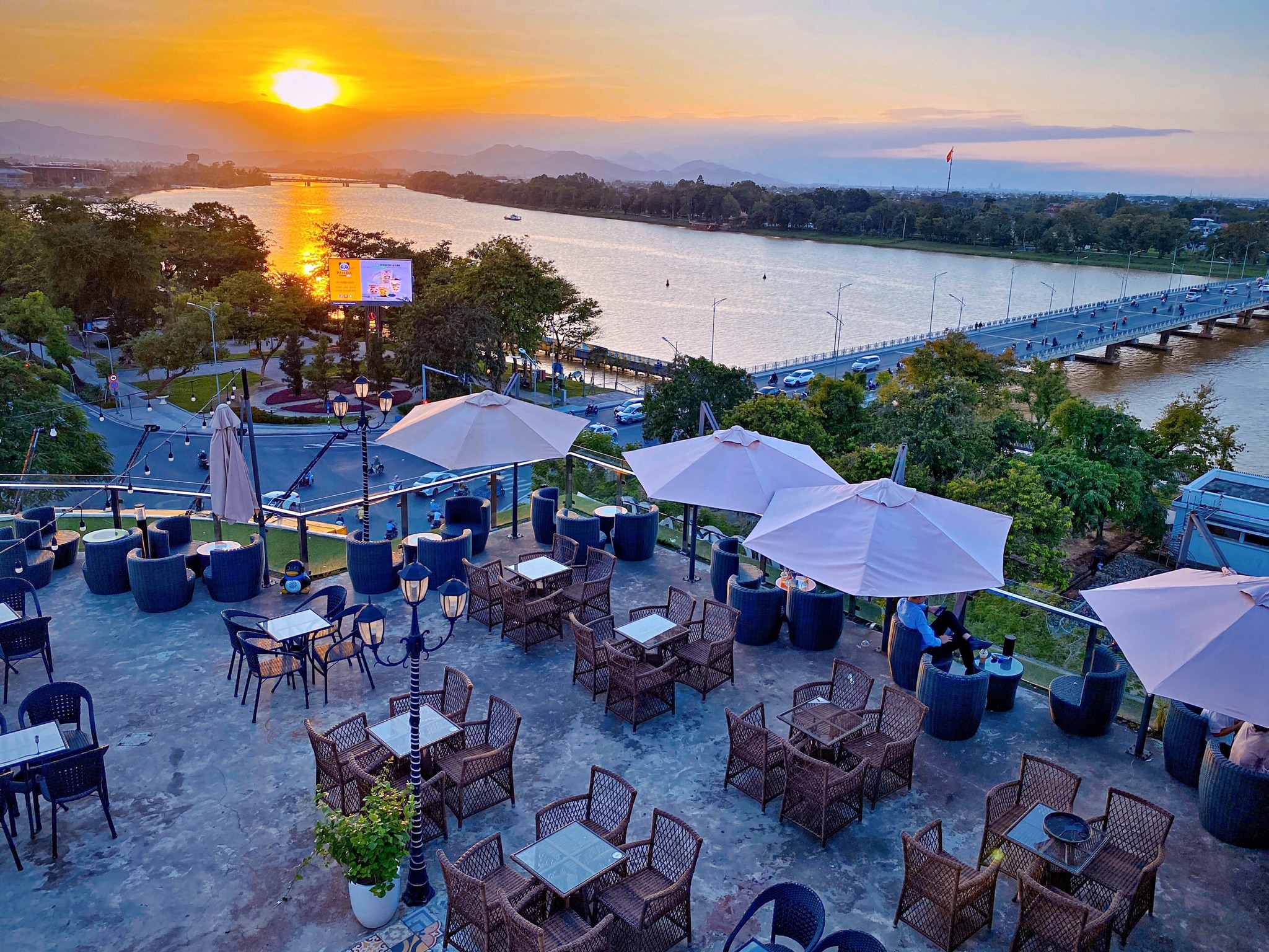 Quiet riverside café in Hue with a romantic evening atmosphere