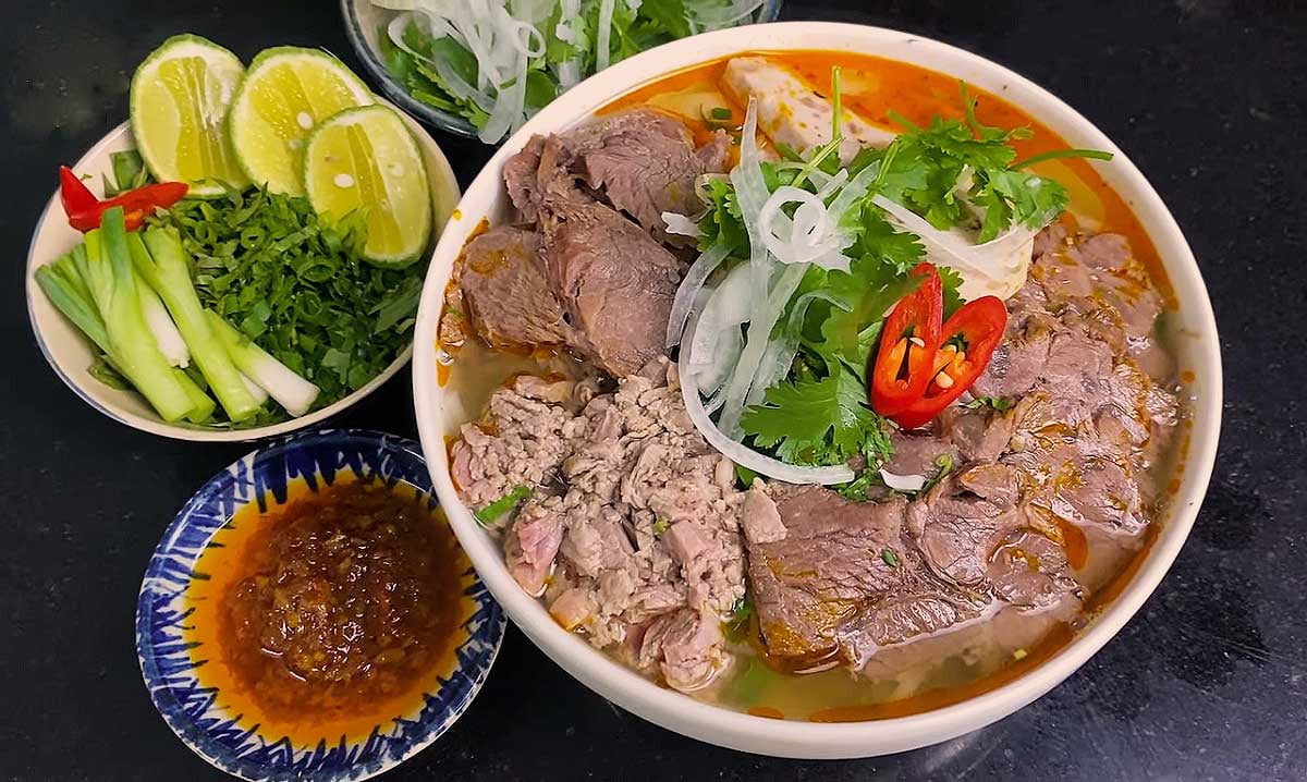 Traditional Hue dishes including bun bo Hue and banh beo served at local eateries